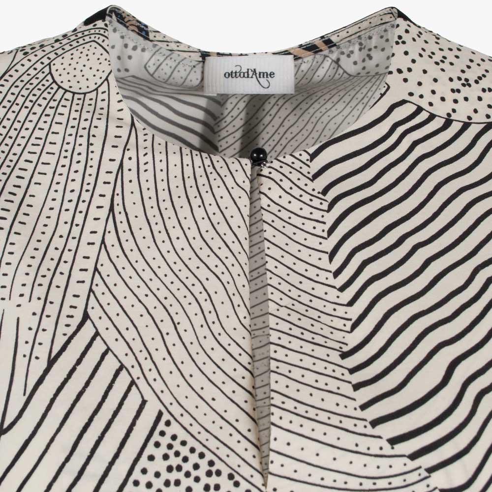 Maxikleid Print, Detail Ausschnitt | creme